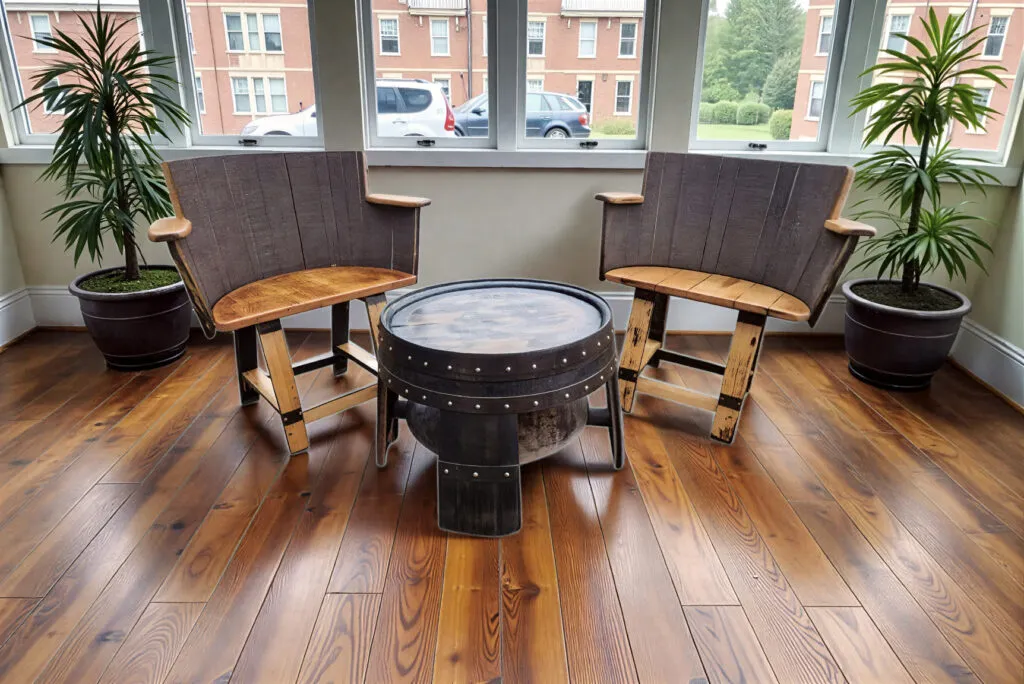Whisky barrel armchairs and round coffee table set in an indoor seating area