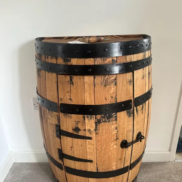 A half barrel cabinet bought as a gift, photographed by Crystal