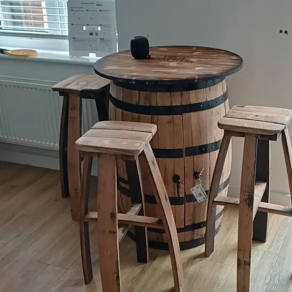 A barrel cabinet table and stools at home, photographed by Michael