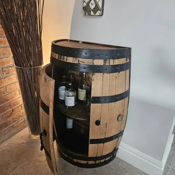 Customer photo of an oak half barrel drinks cabinet