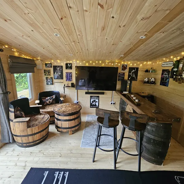 Customer photo of a barrel furniture set in a summer house bar