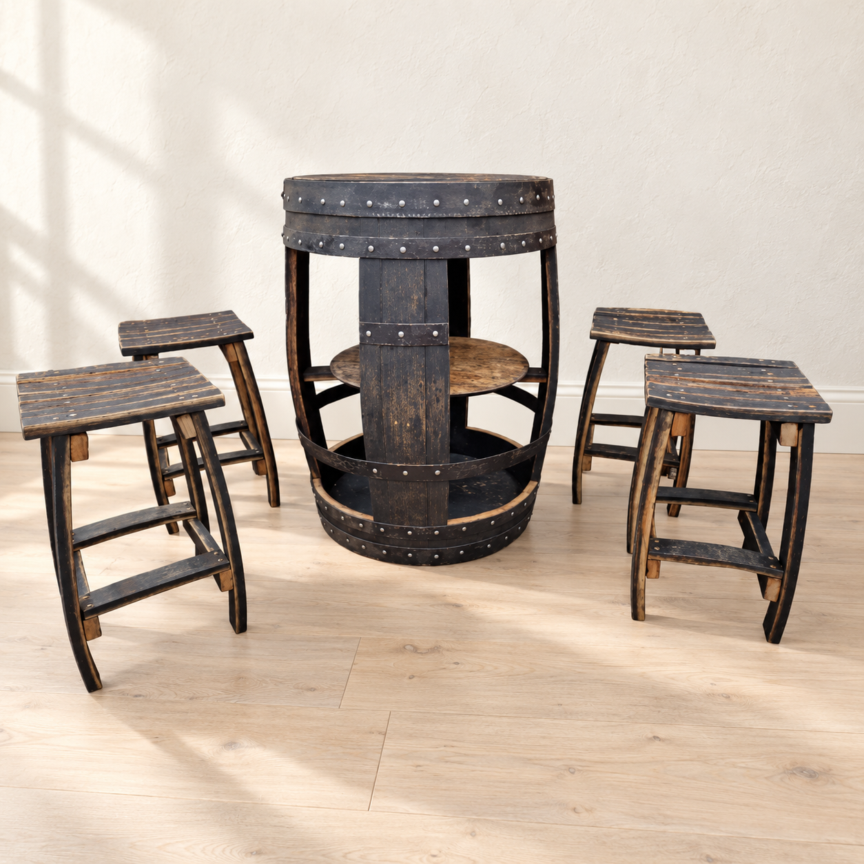 Dark oak open barrel bar table with four matching stools in a bright room